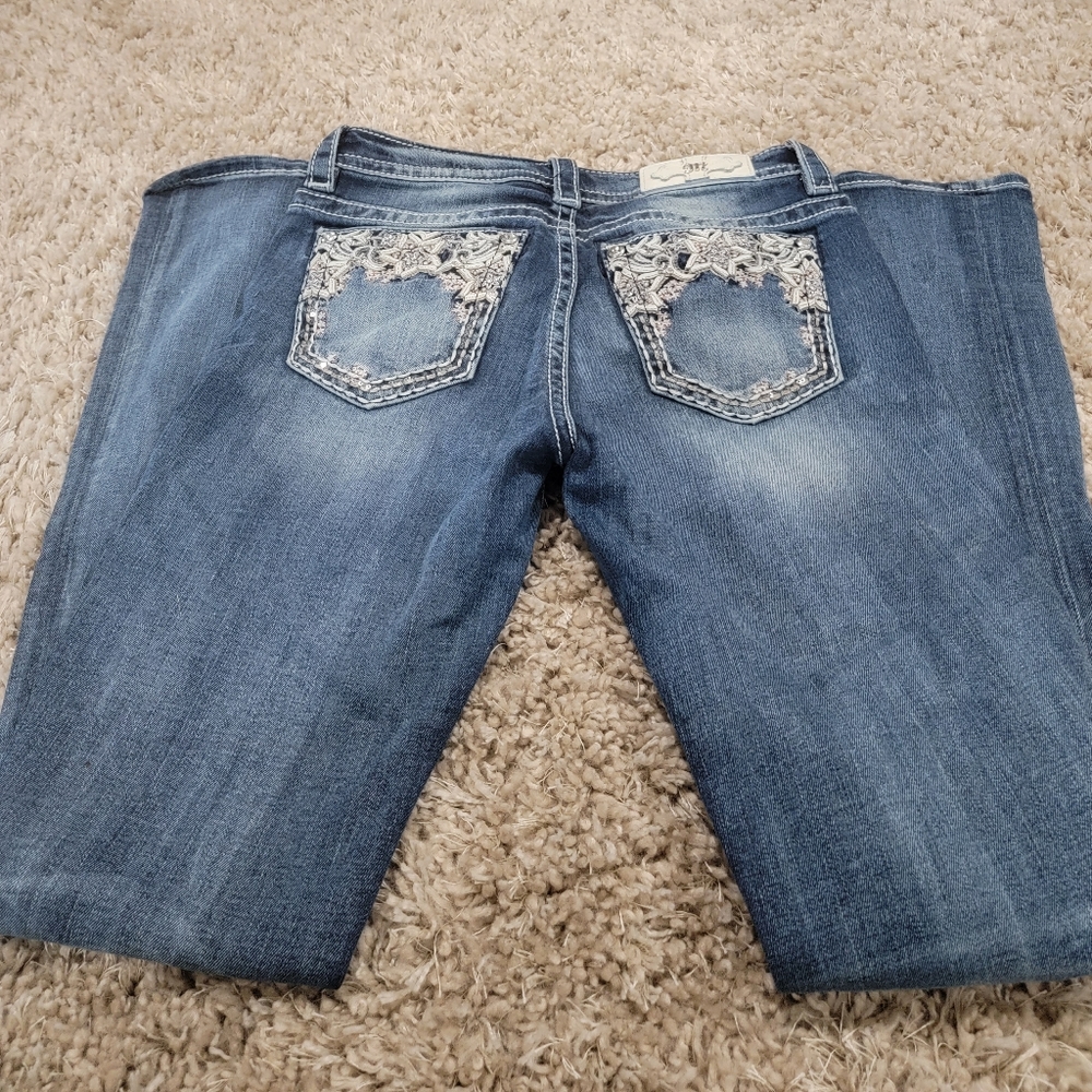 Miss Me jeans bootcut cut size 28.   Inseam is 34